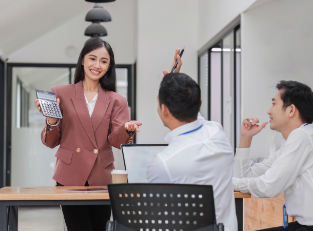 Financial advisor presenting lending solutions to business clients